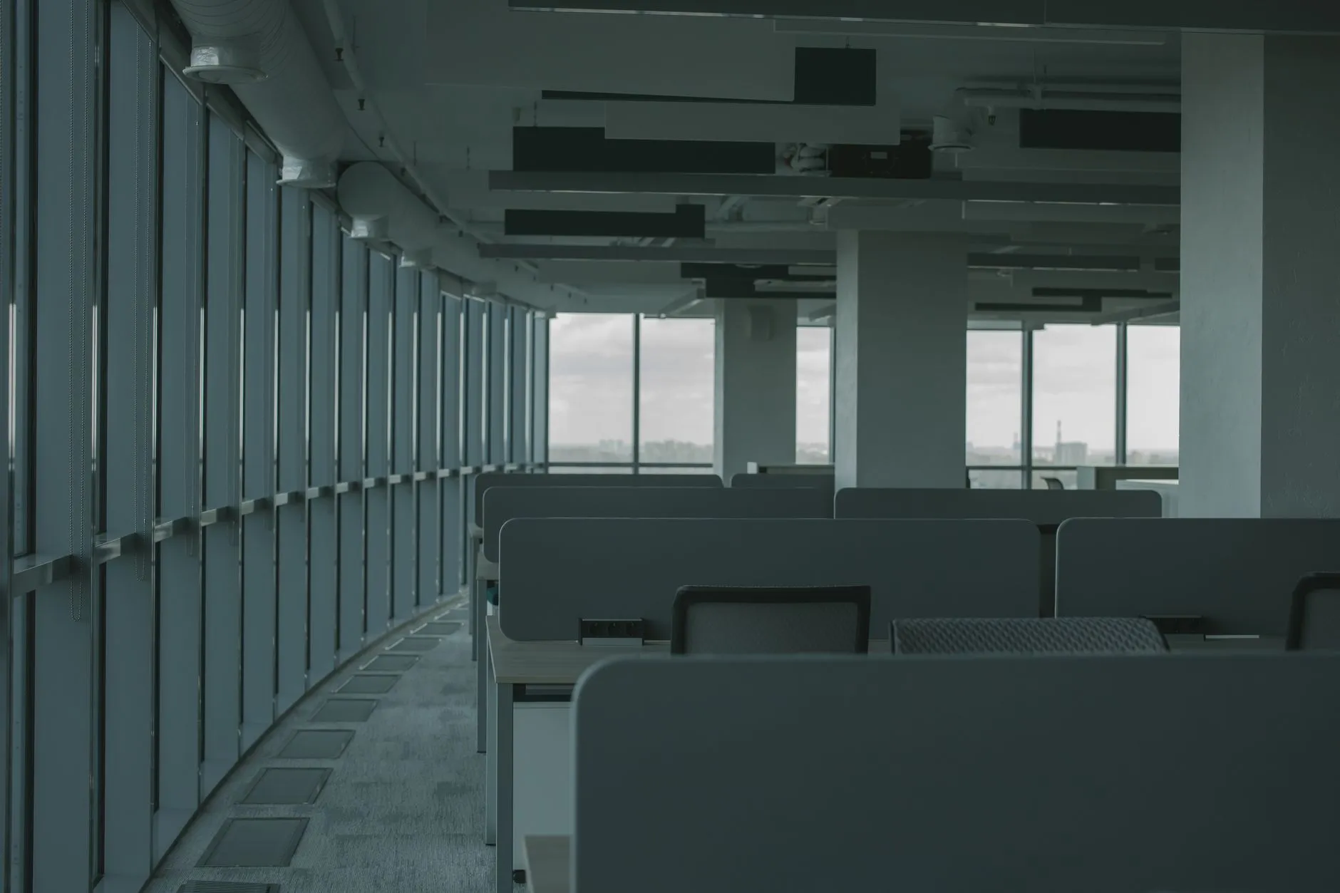 Open plan office interior lit by commercial luminaires supplied by an LED lighting manufacturer