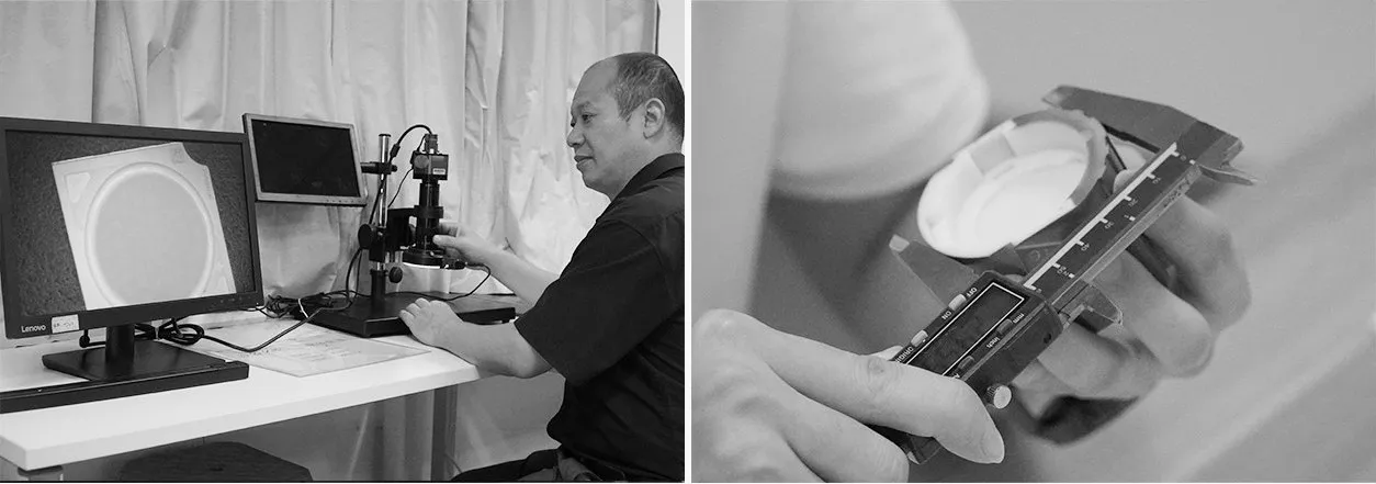 ENCORE photometric laboratory technician measuring light distribution on an integrating sphere test bench for commercial LED luminaires